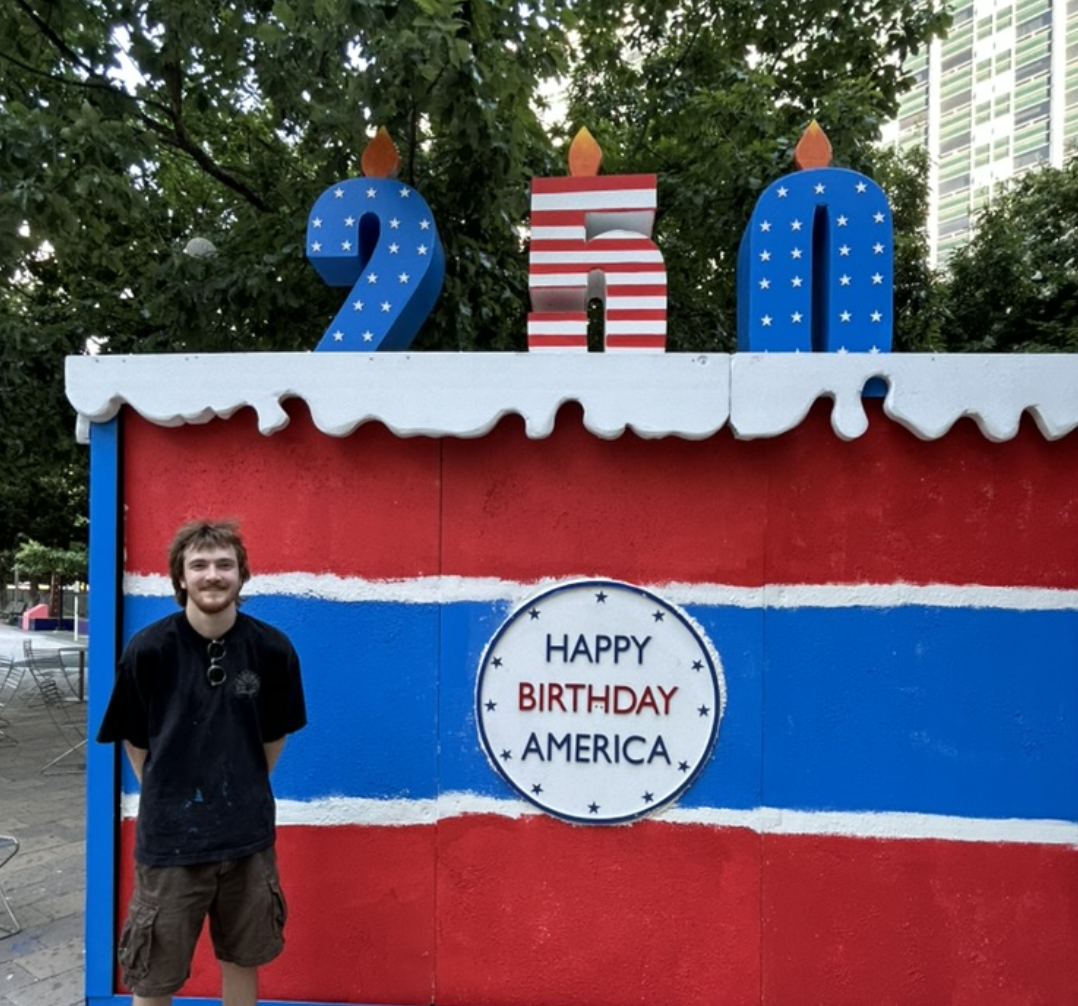 Giant red, white and blue birthday cake celebrating America's 250th anniversary